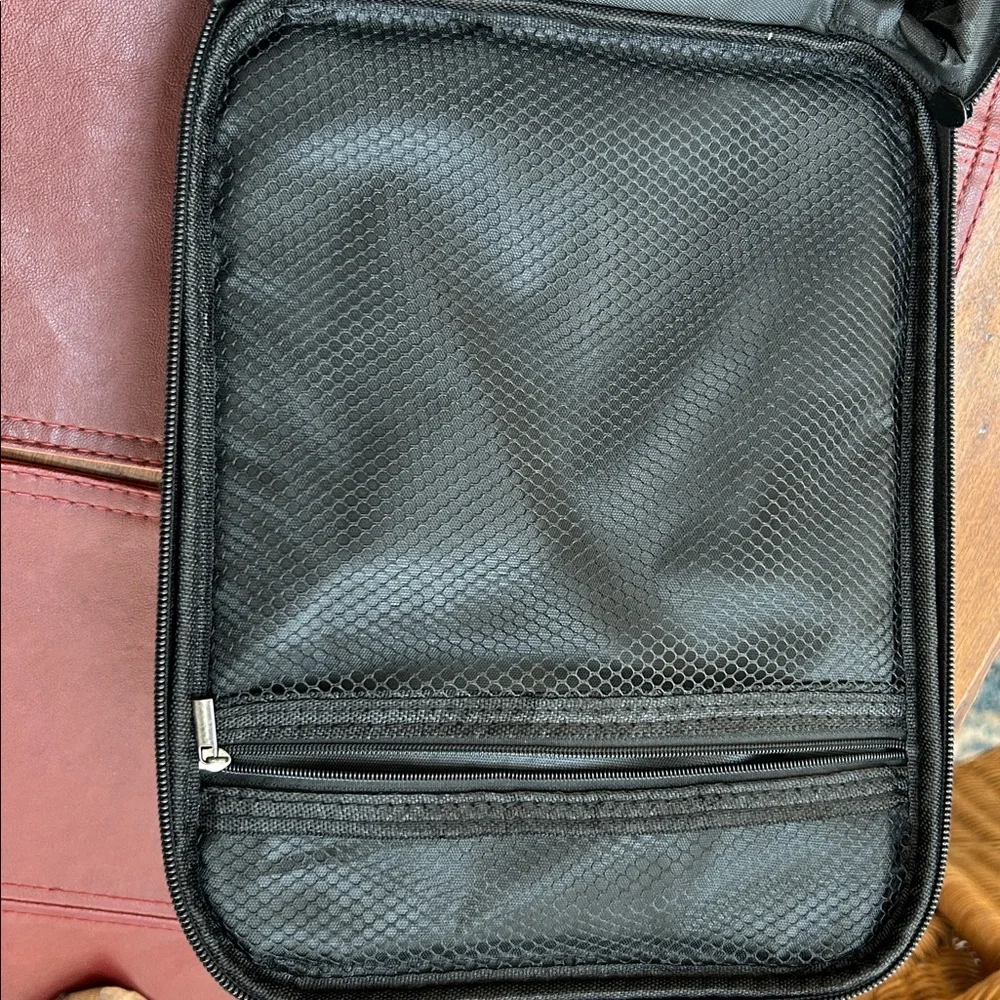 EXO Padded Men's Black Crossbody Bag. Protection for what you carry. 11x8.5”.